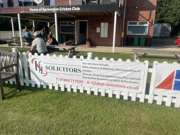 Sponsorship banner at cricket club